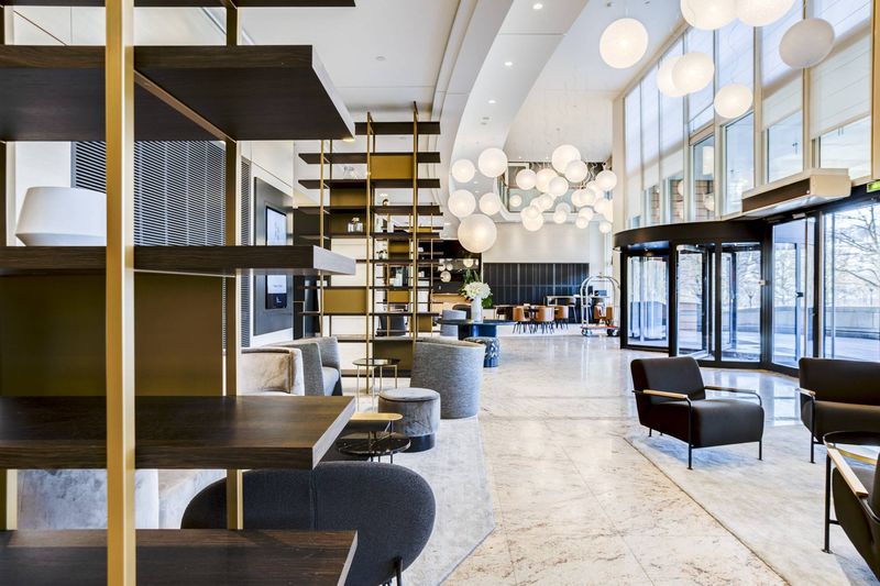 Aménagement Hall Hôtel Marriott Lyon 6 par Arrivetz : Mobilier Design et Luxe